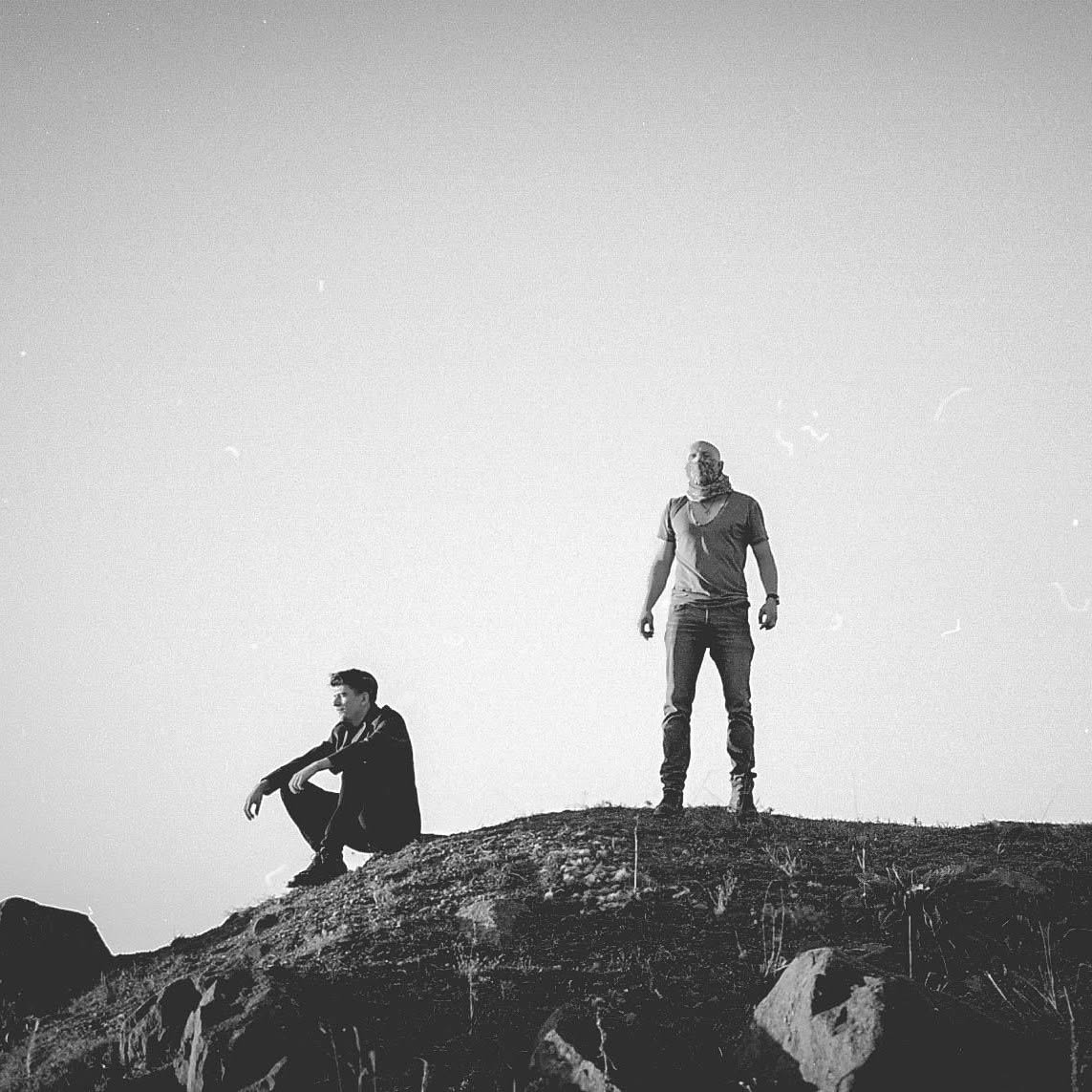 Vio and Dacian on a hilltop, black and white